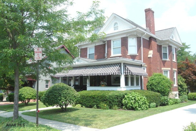 Mr and Mrs Clean live here! Exceptionally well maintained home. The woodwork has been stripped and the floors redone. There is a Misibishi A/C unit that cools the entire first floor.  A 2nd floor  sleeping porch provides a view and a quiet place to relax.  Updated kitchen...stained glass windows...newer bathrooms...concrete driveway...a 40 year roof.  This home needs nothing...just move right in!  4 bedrooms...2 full baths and 2 half baths.  Square footage is for the 1st and 2nd floors....does not count the basement or the semi-finished 3rd floor.
