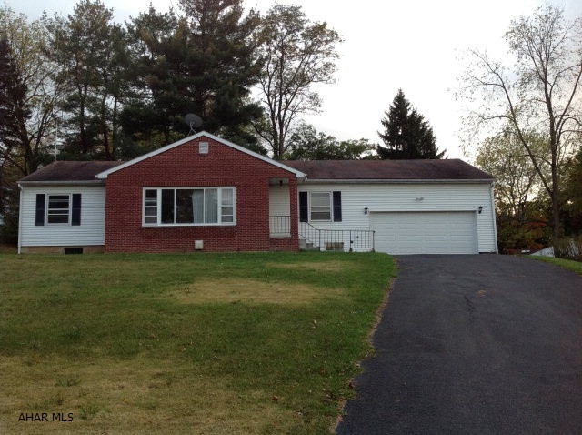 Great Starter Home !!! Make this home your own! Freshly painted throughout. Endless possibilities with this 3 bedroom home walking distance to schools and downtown!!  Spacious with beautiful hardwood flooring and 2 wood fireplaces. Basement can easily be refinished. Nice private backyard.