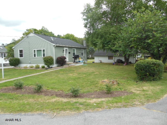 Eldorado ranch home on a corner lot!  3 BR, 1 BA w/shower, 2 car detached garage with openers and a carport on the end. Home is updated with roof(10), garage doors, windows, siding, doors inside and out, new flooring, new electric service scheduled, and more! Woodstove in basement and could have a rec room.  Home sits on its own lot which has underground dog fence, not directly beside a neighbor. Flat area, but not in a flood zone. Very close to stores and mall. Plenty of parking. Must find suitable housing, actively looking to move closer to work...