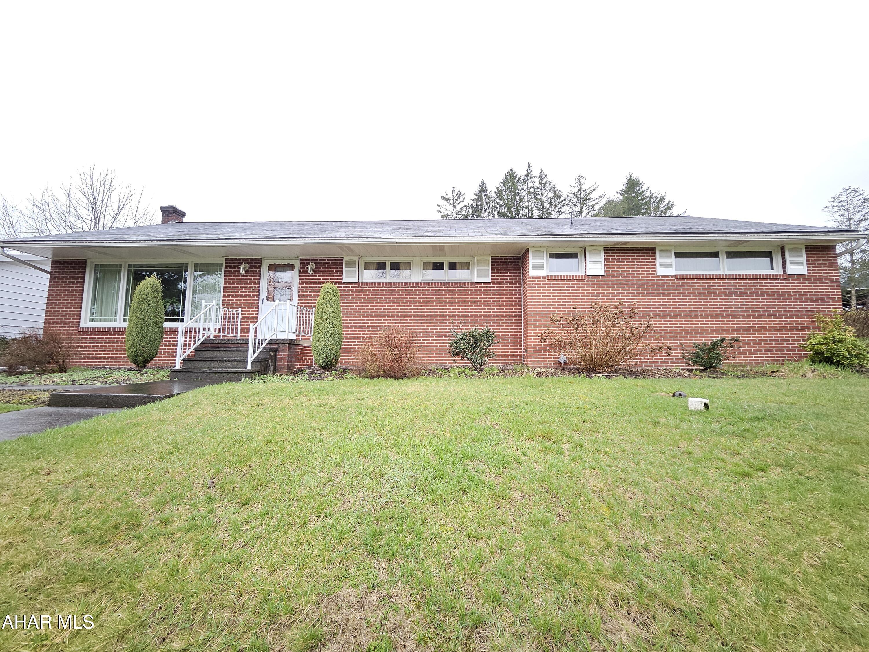 Welcome to this generously sized all-brick ranch home, built in the 1950s.  While this charming home retains its timeless brick exterior and spacious layout, it's ready for your personal touch to bring it into the modern era.  
With 3 bedrooms and 2 bathrooms, this home offers a floor plan that can easily accommodate both family living and entertaining. The large living room features original hardwood floors under the carpets. 
 The adjoining dining area provides space for gatherings. The eat-in kitchen has ample storage and is ready for a fresh update that will make it shine.
The full basement and attached garage add even more potential for storage, a home gym, or a recreation area. Outside, the sizable backyard is perfect for outdoor entertaining or a garden.
Located in a sought-after neighborhood with easy access to I-99, this home is a fantastic opportunity for someone looking to create their dream space in a well-established community.
With its solid construction and spacious rooms, this home is waiting for someone to make it their own and unlock its full potential. Don't miss the chance to transform this charming ranch into your perfect home!
