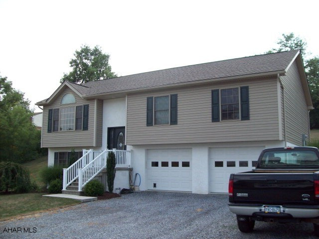 Beautiful upgraded bi-level.  All wood trim and 6 panel wood doors.  Pella thermo windows.  Beautiful kitchen cabinetry including appliances.  Center Island with smooth top range.  Kitchen and dining room with ceramic tile floors. 12x50 patio with 32ft cover.