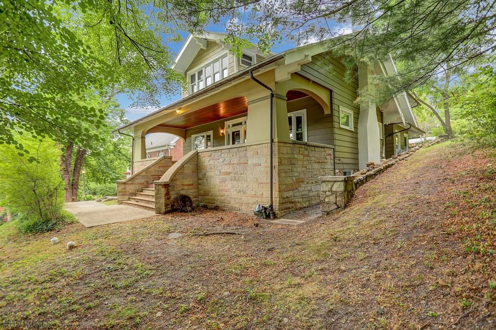 Don't miss this captivating, one of a kind 5 bedroom, 4.5 bath house in the heart of Tyrone! This house has so many fantastic features. Outside showcases a lovely stone exterior, covered front porch with a picturesque view, beautiful landscaping, pergola, 2 car detached garage and 1 car detached garage. Inside features attractive hardwood floors, many unique built-ins throughout the house, ample storage, a spacious kitchen, and generous sized rooms.