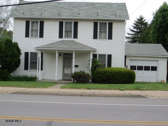 This is a well built older home in Bedford close to downtown.   The house needs some TLC but has a nice warm homey feeling.  Basement is unfinished but has a fully cemented floor.  The large level lot extends to the alley.  This is a good neighborhood with especially nice neighbors.  Electric was upgraded to 200.  Great home for a small family.