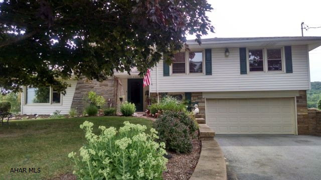 One tremendous buy! What a great home-4BR, 2 1/2 BA 4 level split, with so much space at such a great price. Home has CA, lovely-updated spacious kitchen, 2 car garage-updated a week ago. Huge, flat, beautiful lot. So many updates---Must see attached update list. Please don't wait--will be gone!