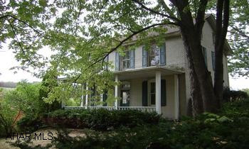 Large 2 Story Brick & Vinyl This home was in the process of being remodeled but not completed.  Great location!  Perfect large family home for the "Do It Yourself-er".  Above ground pool.  Unknown heat source.