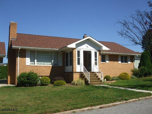 This immaculate brick ranch in Cresson Borough features a level, private back yard, & a two car det. garage.  This home is absolutely move-in ready.  It features a custom oak kitchen, formal dining room, & living with a wood burning fireplace.  Hardwood floor in the hallway will lead you to the three bedrooms.  There is a walk-up attice with ample storage.  This area may be finished to a future bedroom or den.  The full basement is open and has a summer kitchen and 3/4 bath.  The possibilities are endless for this area.