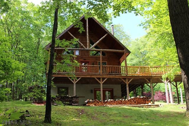 This Beautiful Home Boasts of it's scenic views, 6 car garage and 5 spacious bedrooms. There are trails and access point to the ski resort and to trail riding for four Wheeler and other 4x4 equipment. Want privacy? this home has it. Nestled into 7 acres of land, it's the perfect home away from the chaos of living 'in-town' If you are interested in a beautiful home and breathtaking nature, schedule you showing today!