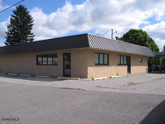3,600 sq ft of commercial potential. Great location with easy access and great visibility.  New roof in 2008. Property is priced right! Parking for 21 cars.