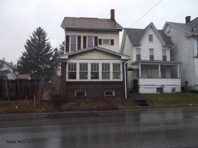 Property is being sold AS IS. 2 story home with 2-BR, 1-BA.
