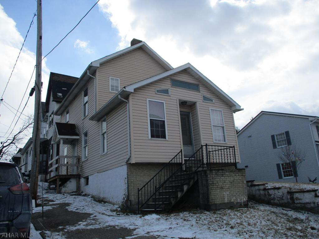 This is a home by the Altoona Schools. Located on a corner lot. This is a vinyl sided two story home with a shingle roof. The main floor has a dining room with laundry hookups in a closet, kitchen and dining room with high ceilings. The second floor has a full bath and two bedrooms with closets. There is a walk up attic. With some custom touches, this house could be your home.