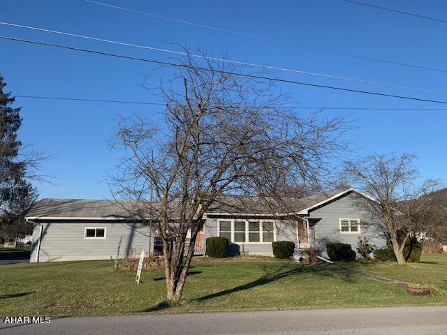 One story living. Large lot, 4 garage stalls, 2 attached and 2 detached. Needs cosmetic repairs, little paint and updated flooring. Newer oil furnace, plus heat pump, wood burner in basement, plus central air. Don't miss this one!