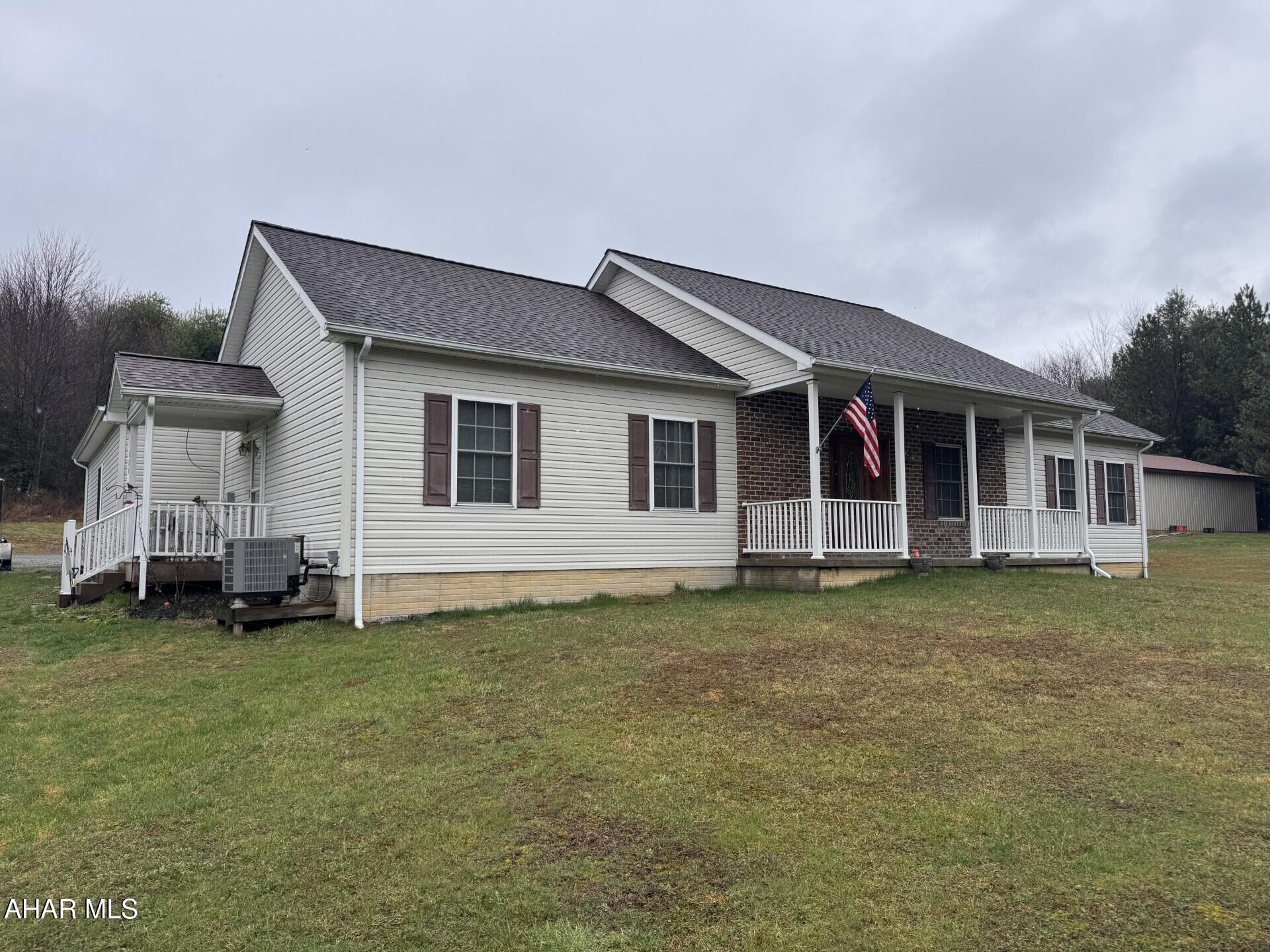 3 bedroom, 2 bath newer ranch home on 5.44 acres. Open floor plan. Spacious eat-in kitchen with granite countertops .Oil, forced air heat.  Heat pump with central air.  2 car attached garage & 30' x 48' metal building great for work area or storage for toys. Private setting.