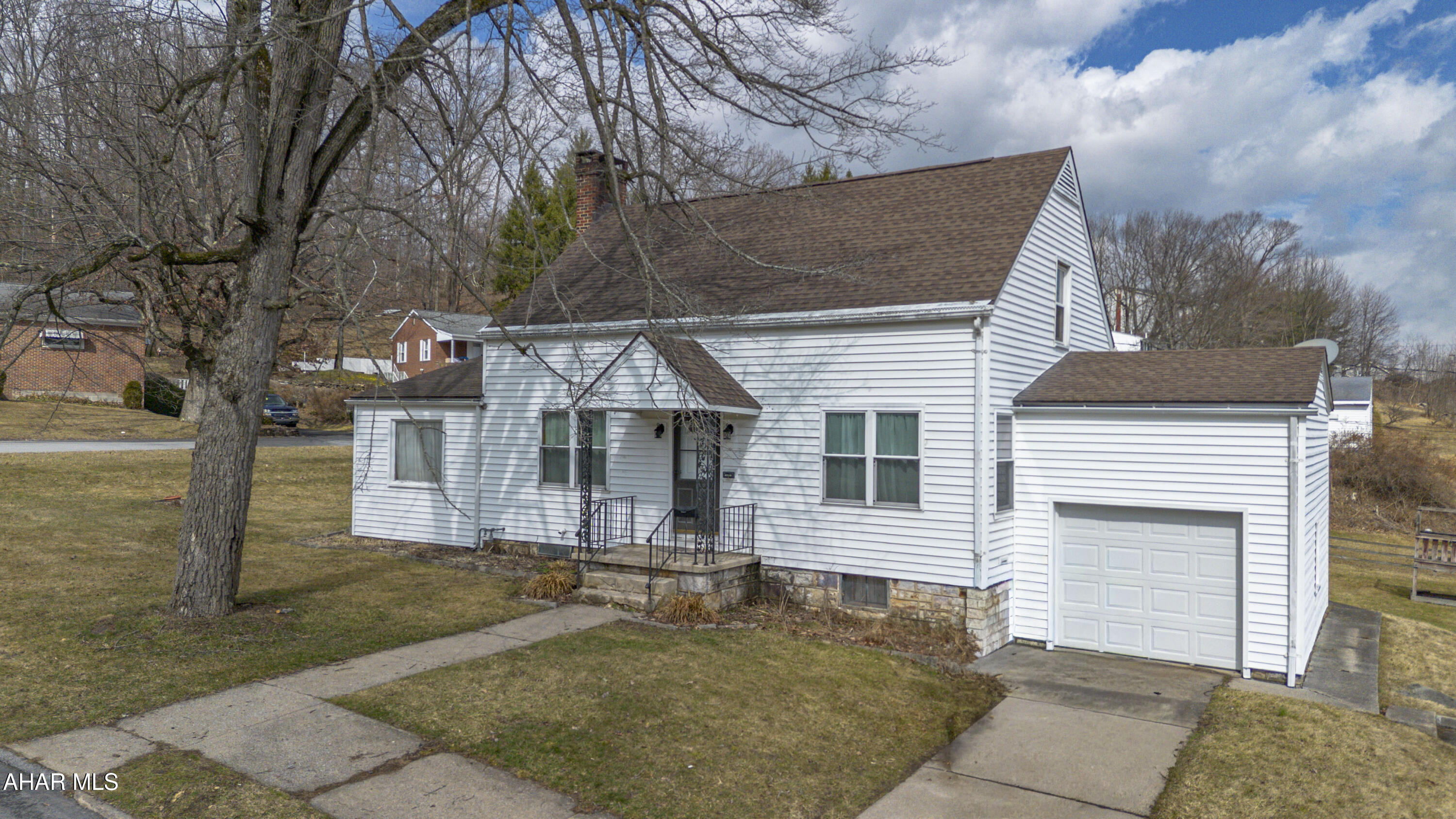 Have you been looking for the perfect home with a huge flat yard on a corner lot on a quiet street? Look no further! 

Welcome to 2714 3rd Street! This 3-bedroom 2-bath home is in close proximity to Penn State Altoona campus. It would be perfect for a family home or even an investment property with it's sought-after location. The home boasts an eat-in kitchen featuring cherrywood slow-close cabinetry & updated appliances and is open to the dining room with plenty of natural light, 1/2 bathroom on the first floor, spacious living room with cozy fireplace and added bonus sunroom/den that could be used as an extra playroom, office, or gym, the possibilities are endless! Upstairs you will find 3 spacious bedrooms, and a full bathroom. Who doesn't appreciate an attached garage too? The best part is the HUGE flat yard on a corner lot, perfect for your pets or entertaining your guests! 

Schedule your showing today!