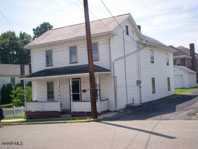 This home is located 1 1/2 blocks from the beautiful downtown area of Bedford,PA in the Historic District. 4BR/1.5 baths, LR, DR, eat-in kitchen, bonus room with pantry and first floor laundry, hardwood floors, enclosed porch, nice size lot, 15 x 12 outbuilding. Vinyl sided, remodeled bath, OHW heat, newer furnace.