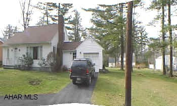 2 bedroom, 1.5 bath.  I story home on 150x180 lot.  Formal dining room, living room w/ fireplace.  Hardwood floors, vinyl siding.  Newer furnance, hot water heat.  Low taxes.  4 year old roof. 100 amp fuse, gas hw heat.  lg closets.  150x180 lot, fireplace in LR.  newer furnance and hw heater.  .5 bath in laundry room.