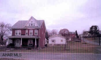 Subject is a 2 1/2 story brick with total of 100 x 120 lot and 2 car detached garage.  4 bedrooms and 1.5 baths.  Some replacement windows.  Tenant occupied at $425 per month.  Lease does not expire until August of 06.