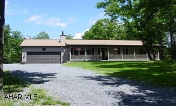 New  3 bedroom ranch home on approx. 2 acres loaded with appliances with nature all around you.  Fireplace, Central Air, open floor plan to mention a few of the many amenities.  Call Lacy at 724-494-1086. Newly constructed Ranch Home with wooded views surrounded by the beauty of nature with the ability to live on main floor.  The front of the home is framed by a covered 47' x 4' porch.  Relax in front of the gas fireplace or enjoy the secluded mountain setting on the 26' x 10' deck.  Open ceiling from living room to kitchen that in enhanced with beautiful oak cabinets and quality craftmanship with solid pine doors.  Stay cool with the cental air or tinker in the garage.  The basement is partially finished and already studded and plumbed for your convenience.  Master bedroom features dual sinks, shower stall, and jetted tub.  This home comes with all the appliances and is ready for you to put your name on the mailbox with just a call to Lacy at (724)494-1086.