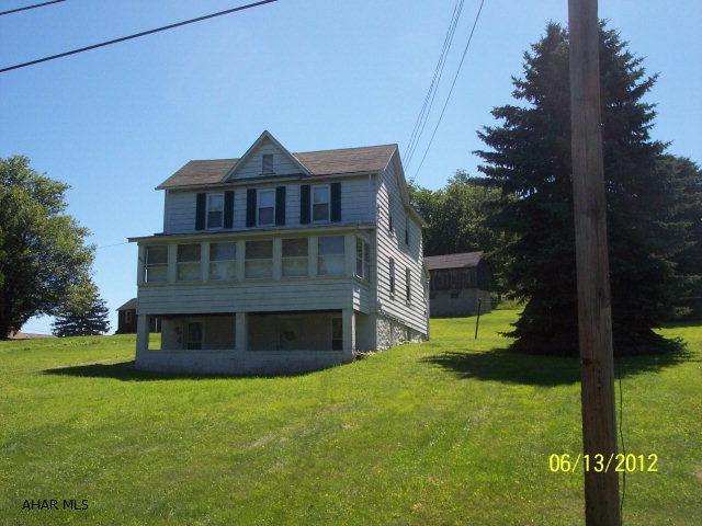 Property can be purchased without the additional 9.8 acres behind the house.  The asking price for the house and 1.72 acres is $55,000.