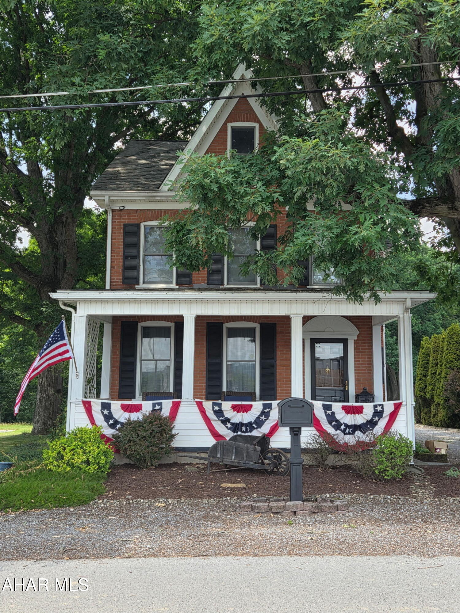 STUNNING as soon as you enter! Kitchen is open to living room area and is very inviting! This home is a MUST SEE! Don't just drive by!... Does not do it justice... sits on a tad over an acre of FLAT ground and offers a 2 car detached garage.