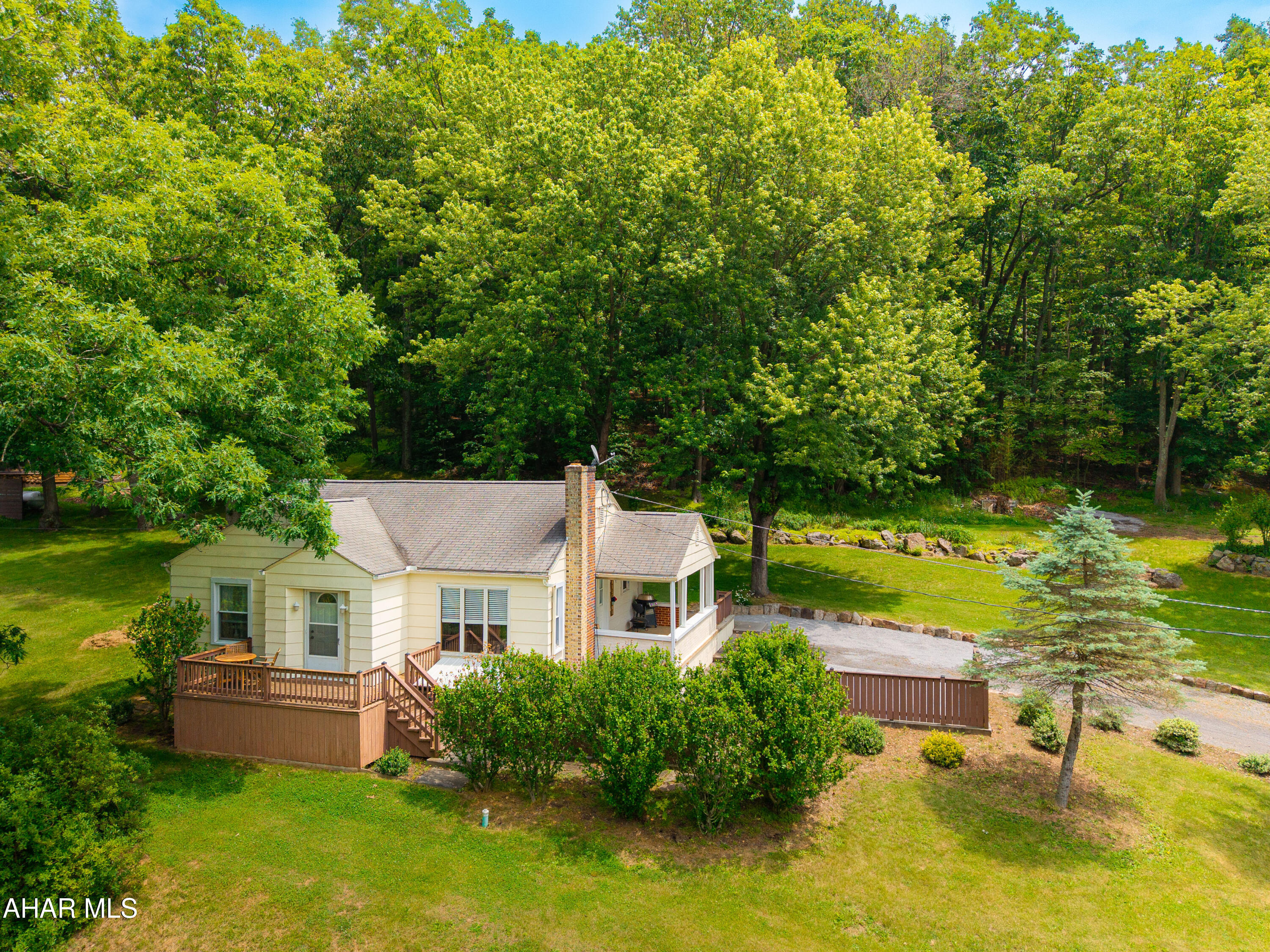 Tucked along Imlertown Road in Bedford, this property offers the kind of outdoor space people keep saying they want: a private backyard, room to breathe, and a home with more usable space than you might expect.

Sitting on 1.36 acres, 1048 Imlertown Road features a beautiful yard, mature greenery, and a peaceful setting that's perfect for relaxing, entertaining, gardening, or simply enjoying a little extra elbow room. Inside, you'll find comfortable main-level living space, 2 bedrooms, and a finished basement offering valuable additional space for a family room, office, workout area, hobby room, or guest space. The home also features central A/C and forced-air heat for everyday comfort. Outside, the detached 1-car garage adds even more value with space above for storage, hobbies, or a workshop.