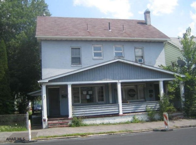 Altoona 2 story double house. Each side is a large 3 bedroom, 1 bath in need of TLC. Could be nice with some work. 2 car detached garage. Sold As Is.  1 unit occupied and can not guarantee unit will be vacant before closing.
