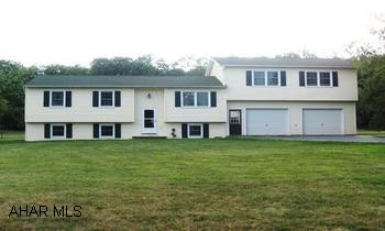 COUNTRY LIVING ON 2 ACRES. 4 BR, 1.5 BATH BI-LEVEL WITH ALL THE NEW INTERIOR FEATURING NEW CHERRY KITCHEN, NEW BATHS, WINDOWS, FURNACE, FLOORING, ELECTRIC, PLUS A 2 CAR GARAGE. CALL LORA FOR MORE INFO. 814-931-1018.