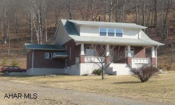 Nice 2BR/2BA Brick Cape Cod on 2.5 acre lot with attached 3 car garage. Nice 2BR/2BA Brick Cape Cod on 2.5 acre lot with attached 3 car garage. The home has been remodeled top to bottom with new oak kitchen, new bathroom. The home includes a large living room and dining room, breakfast area and laundry/utility room. Oil hot water heat and heat pump.  A second level garage space (30'x36') is available for possible commercial use as an apartment, offices or storage space. Ten (10) 12'x24' storage units on a 1 acre lot also available for combined price of $259,900.