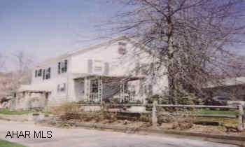 LARGE 2-STY W/MANY POSSIBILITIES. PROPERTY HAS DAMAGE TO WALLS FROM MOLD & MILDEW. SOLD  "AS IS". 2 OTHER PARCELS INCLUDED. 34-28-106 & 34-28-100.001CALL LOUANN HOFFMAN FOR MORE DETAILS.
