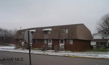 Four Unit - 2 bedroom townhouse building. Good rental income. Good rental history. $5000 sellers concessions for roof repair. Agent owned.