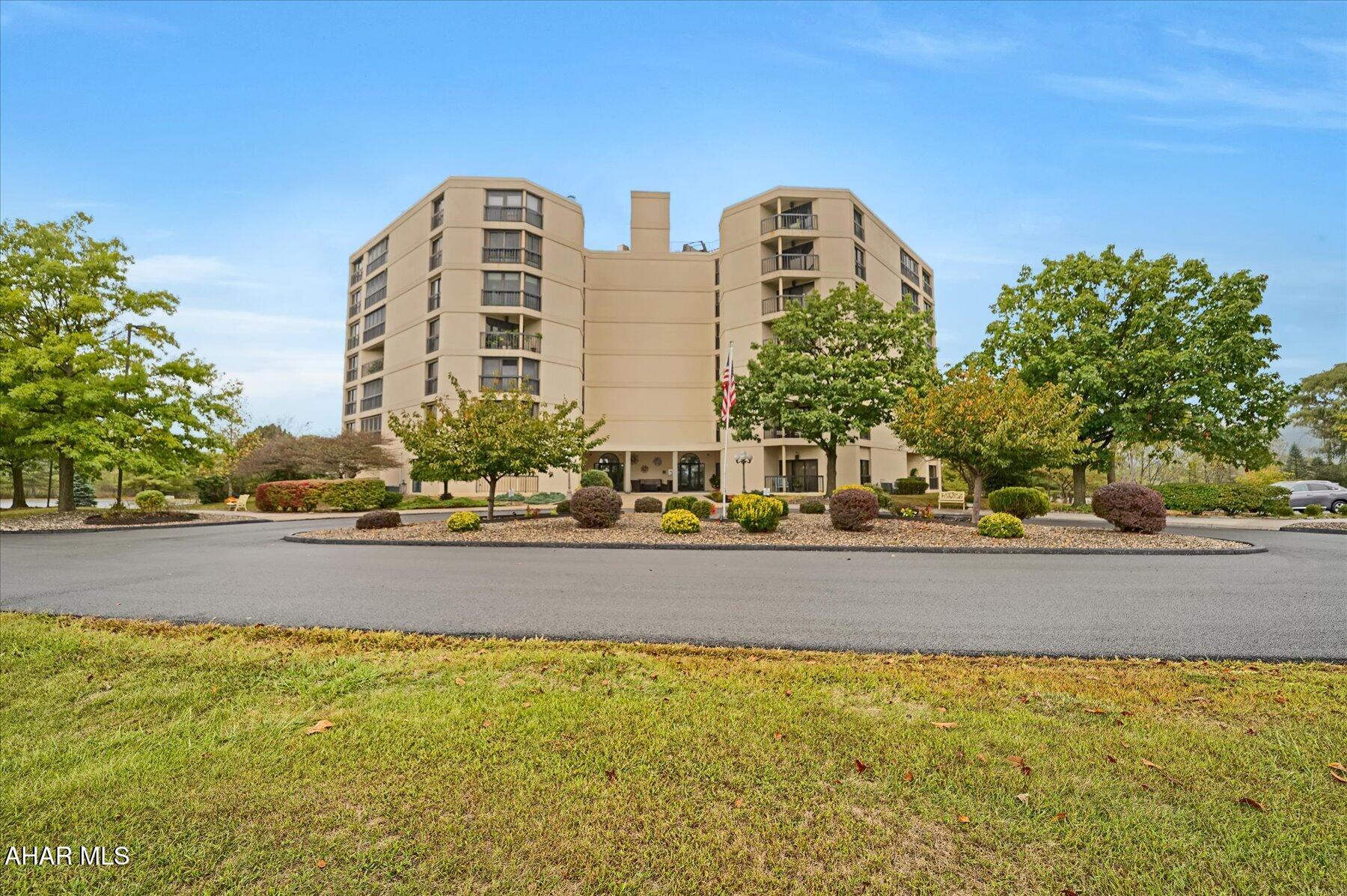 Step into convenience and style with this tastefully renovated 2 bedroom, 2 bath Park View condominium. This spacious unit features a thoughtfully designed open floor plan, perfect for relaxing or entertaining. Enjoy the new kitchen that features plenty of cabinets and drawers for storage, a center island and modern backsplash. A flexible den with sitting area is located just off the kitchen that features a desk work station and recessed TV nook. The living and dining areas flow seamlessly with all new hardwood flooring. A sleek, custom built stone top desk with built-in storage and shelves transforms the living room into a versatile space, ideal for a home office, entertaining or displaying decor. Primary suite offers a peaceful retreat with a private balcony and stunning views of the golf course and sylvan landscape.  It also features a completely renovated primary bath with walk-in shower and modern finishes. The 2nd bedroom is equally inviting, also with a private balcony along with a fully renovated bath and walk-in shower. 

Community amenities include a social room with patio and grill, library, secure storage unit and assigned parking space in garage. Enjoy peace of mind with the secure front entrance with video intercom system. HOA fee includes water, sewer, trash, exterior and common area maintenance.

Conveniently located near shopping, dining, and I-99, elevate your lifestyle today!
