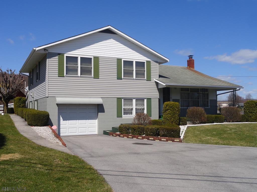 Country living at its best!  3 Bed Multilevel on 1.81 acres!  Home offers integral garage plus 32x32 detached garage, carport with loft.  Also included is a large covered pavilion for outside fun!