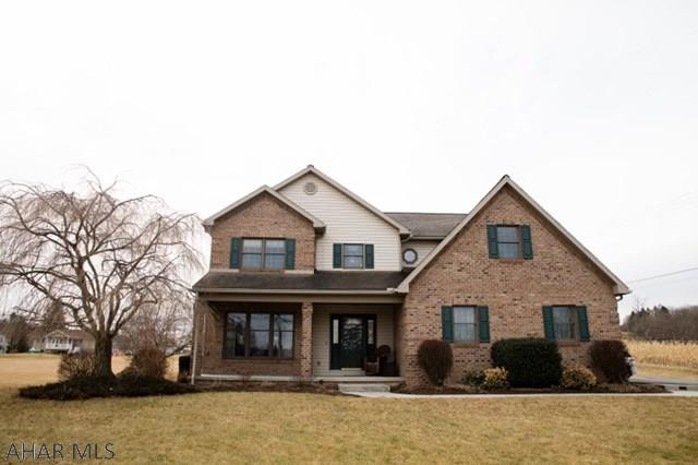 Custom built brick/vinyl home, located on 2.148 acres. Outside features a heated in ground pool, pool house w/ bath facilities. Detached 2 car garage, attached 2 car garage and a Bank Barn w/ many uses. Easy care landscaping, great rear patio and front porch, paved driveway. Walk inside to the hardwood foyer. Open concept kitchen w/ breakfast nook looks into the inviting family room w/ wood fireplace. Formal dining and living room w/ lovely natural light from the many windows. Laundry room and half bath complete the main level. Grand staircase leads to 4 large bedrooms and full bath. The master features a walk-in closet and master bath. Home has crown molding through out and many other custom touches. Basement has a large semi finished family/game room, storage and utility areas.