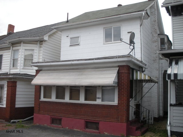 2 unit duplex with separate electric, currently used as a single family home. 1st floor unit has 1 bedroom, 2nd floor unit has 2 bedrooms. Lots of potential for rental income.