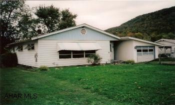 Potential galore in this home. Newer furnace. Minutes from town, easy commute. Hardwood floors throughout.