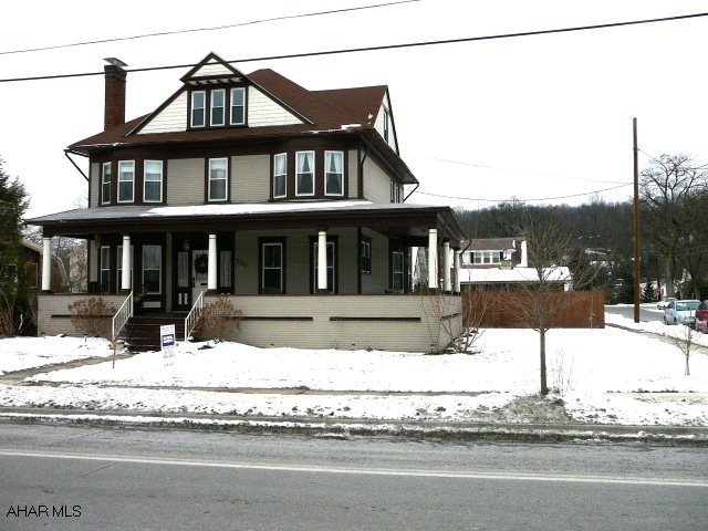 Large rooms with lots of natural light for that open, airy feeling.  Wood plank floors throughout.  Tile flooring in kitchen, baths, and 2nd floor laundry room.  Whirlpool tub in first floor bath.  Kitchen includes refrigerator, range, microwave, garbage disposal, dishwasher, pantry.  One gas fireplace and one woodburning fireplace.  Storage room on 3rd floor with add'l. storage above that.  Large deck of kitchen, wide wrap-around porch, wood fenced back yard, one car detached drive through garage, corner lot.  Baker Elementary School.  Convenient to shopping and I-99.  Motivated seller.