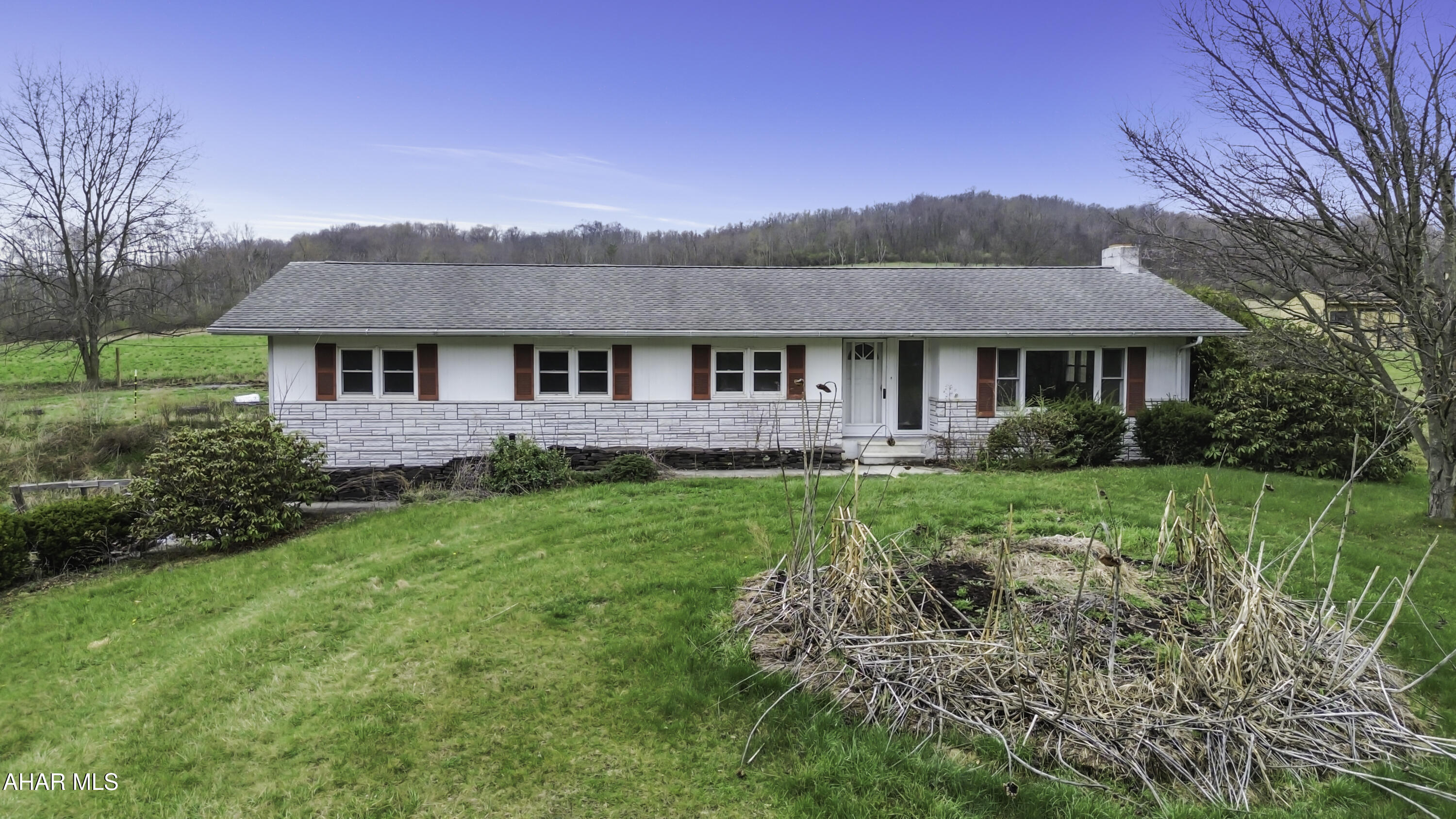 Welcome to 13637 Dunnings Highway, located in the Claysburg-Kimmel School District! This spacious ranch-style home offers a fantastic layout and endless potential for its next owner. The main level features a bright and inviting living room filled with natural light, a dedicated dining area, convenient first-floor laundry, and your kitchen that flows into a comfortable family room - perfect for everyday living and entertaining. You'll also find two well-sized bedrooms, a full bathroom, and a private primary suite complete with a large closet and its own full bath. The full basement provides excellent additional space, including your 2 car garage, ample storage, and room for future finishing if desired. Outside, enjoy a large driveway, expansive front and rear yards, a rear patio, and a fenced-in area for added functionality. Don't miss your opportunity to make this home your own. Schedule your private showing today!