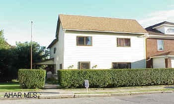 Large home with big rooms. There is a dressing area in master bedroom and a waterbed that is negotiable.   Oversized garage is heated with 1/2 bath.   The second story of the garage has a deck and is insulated, heated, and used as a workshop.   New water line from the street.  Furnace and roof are 3 years old.