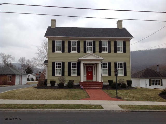 Nicely renovated historic home! Orginial pinewood flooring in dining and living rm, crown molding, and a fireplace. Claw foot tub in the full BA off the living rm. Custom cherry kitchen features, lg granite island with 2 sinks, 2 intergrated dishwasher and 2 disposals. Wine cooler, pocket panel pantry, recessed lighting, Wolf double ovens and warmer oven, lg 4 burner gas stove,Sub-Zero Intergrated cherry panel refrigerator and 2 drawer freezer. Radiant heated ceramic flooring, carpeted Master BA with his & her closet, french doors out to the balcony, granite double sinks and bath. Sunroom/breakfast nook leads out to the back deck and onto a spacious patio.  24x24 2 car detached garage.  A Must See!!