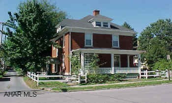 Solid, Federal Style, brick home in excellent location.  Historic District.  Cozy 3rd floor finished with powder room.  3/4 bath in basement.