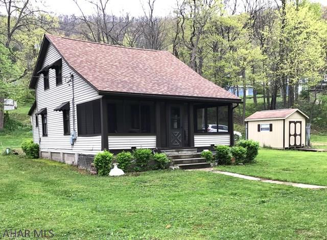Escape from city life in historic Bedford County in this quaint riverside cottage. Beautifully maintained home, accommodates 4 queen beds, 2 bathrooms, living room, kitchen, dining room and laundry room. A large screened in porch takes in gorgeous views of the water and allows nature to be part of the indoor space. Bedford is known for its restaurants, boutiques and the Omni Bedford Springs Resort Hotel. A private dock completes this package. So, grab your fishing pole and flip flops and prepare to relax and enjoy this beautiful riverside setting just minutes from Historic Downtown Bedford PA.