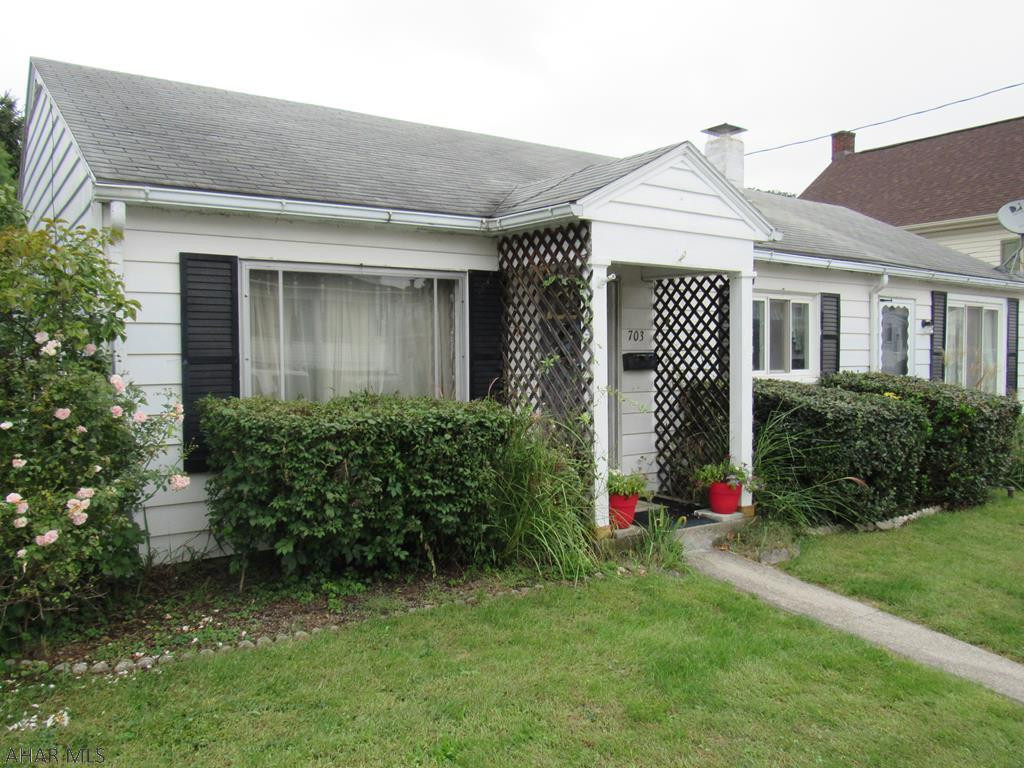 Ranch home conveniently located near schools, hospital and shopping.Wonderful deck overlooking a spacious fenced in backyard, with an alley in rear you could add a garage. The bathroom was remodeled. Plenty of storage in the unfinished walk out basement. Don't miss out on this great starter home!.