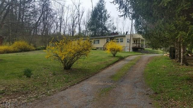 Nice ranch house overlooking the Raystown Branch of the Juniata River. This could be a great get-away place or for year round living. It offers a large living room with wood burning fireplace, an eat-in kitchen, dining room, two bedrooms and a full bath. Most furnishings are included along with a row boat to navigate the river. Property offers on site fishing, boating and a relaxing atmosphere to unwind. The area is in close proximity to state game lands and the new H&BT rail and trail system for hiking and biking. Don't miss this great opportunity to experience life along the river.