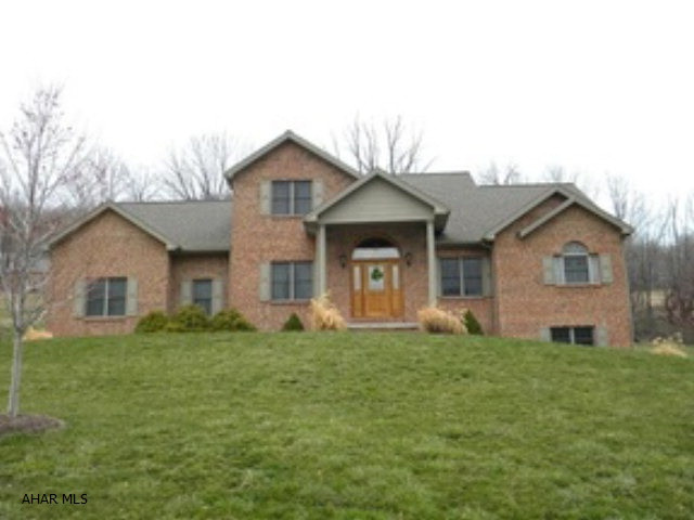 REDUCED!! NOW PRICED BELOW APPRAISAL!!!! Inspections already done (saving your buyer $$)  Very spacious and lovely 2 story Brick/vinyl home offers 4BR, 4.5BA with 1st floor Master suite w/ master bath.  1st floor laundry. 2 story Great room w/balcony loft. Zoned heat.  Basement offers Recreation room, 3/4 bath and walk out.  Professionally landscaped w/drip irrigation system.  Sits on extra large lot w/invisible dog fence professionally installed. Avg. electric $120 per month, Avg. Gas bill $96 per month.  Sewage $504 PER 2010 YEAR.    HOME WARRANTY INCLUDED!