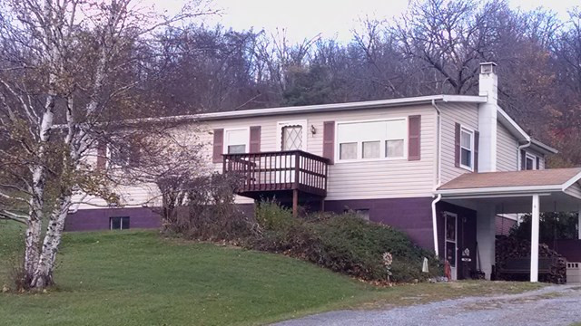 Great location, country setting but close to I-99. Nicely updated 3 bedroom, raised ranch, newer appliances, furnace, CA, windows, 10 x 16 addition leads to large deck and 3 year old above ground pool. Finished basement with large family room with wood burner and storage. 12 x 16 detached 1 car garage used for storage. Must See! 2017 taxes $1117.00