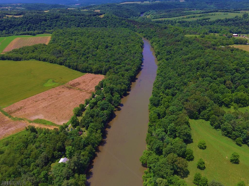 One of a kind riverfront residence and campground. This property offers a 3 bed/1.5 bath cottage, 5 camper cabins, bath house, 30+ camp sites, pavilion, 30+/- acres, and approx. 3/4 mile of river frontage on the Raystown Branch of the Juniata River. The property is currently being used as a campground/residence and offers endless opportunities with a secluded setting and convenient access to major highways and the PA Turnpike. Utilities include electric, 3 septic systems, 3 wells, Dump Station, and 2 permitted privy's. Call the Listing Agent today for a tour of the property before its too late and the opportunity passes you by! Interior photos available upon request.