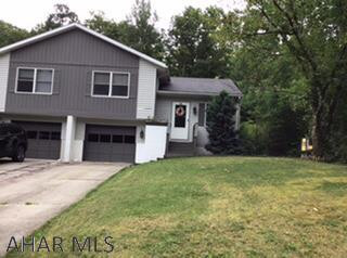 Beautiful half double ready to move in!  2BR/1.5 BA with rear deck and garage!