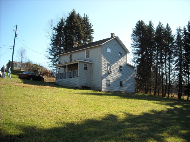 Decent 3+ bedroom, 2 bath home in Flinton area that has been used as a hunting lodge. Has some furnishings & appliances. This sets on about 1.2 acres and has a barn with a rubber roof. OFA & wood/coal integrated furnace, 200 amp electric, large kitchen, basement walk-out at ground level, attic storage, shingle roof. Some replaced windows. Public water & sewer is now hooked-up!!  Only needs some cosmetic things. Don't wait... Videos:  Inside: http://youtu.be/4P030ayd_p8 & Basement: http://youtu.be/GChGITh5w0Y