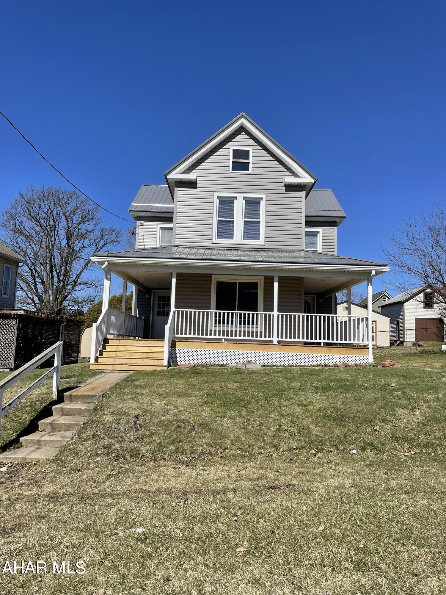 This home in Cresson Borough has had major renovations to it both inside and out!  Guests can hang their coats/remove shoes in the large mudroom, first floor laundry can accommodate gas or electric dryer, the spacious kitchen has plenty of cabinets for storage and an island for meal prep, first floor flows nicely from the kitchen into dining area and then into the large living room. Upstairs you will find 3 bedrooms all with plenty of storage space. Both back deck and front porch are rebuilt, new cement sidewalk was poured behind the house. New siding, new roof, new soffit and facia, new lighting on porches, new flooring in dining/living room, new carpet and renovated bathroom. Home has great natural lighting with newer windows, updated electrical panel, and all newer appliances. Nothing to do but move on in!  Currently tenant occupied on month to month basis. Must have pre approval and give 48hr notice for showings.