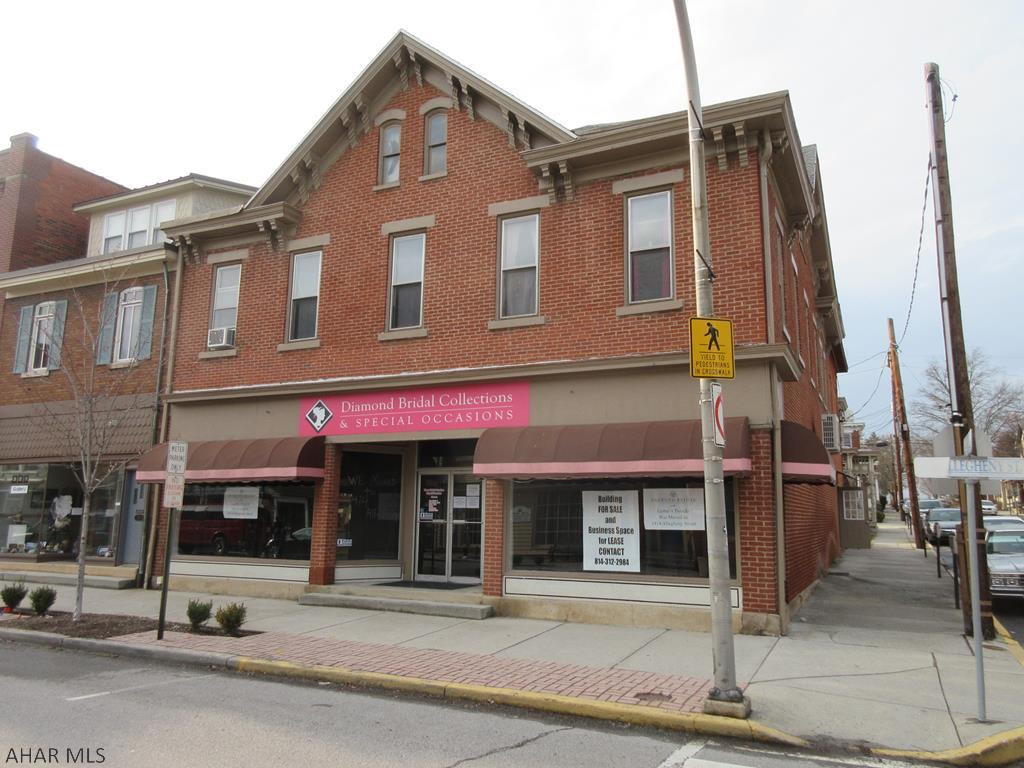 Historic Hollidaysburg landmark 5 unit commercial property. Approx 4,800+ square feet that includes 2,400 sq ft 1st floor commercial space plus 4 fully rented apartment units. Move your business right into the vacant first floor space and collect the rents from day one. This well known and admired building has been home to many successful businesses over the years. It is on the main business road in Historic Hollidaysburg and only 1 block off the Diamond. It is an easy walk to the Blair County Court House, post office, laundromat along with numerous restaurants and stores. You can have it all! Call today. All taxes, square footages and land quantities are estimated. Buyer to verify amounts.