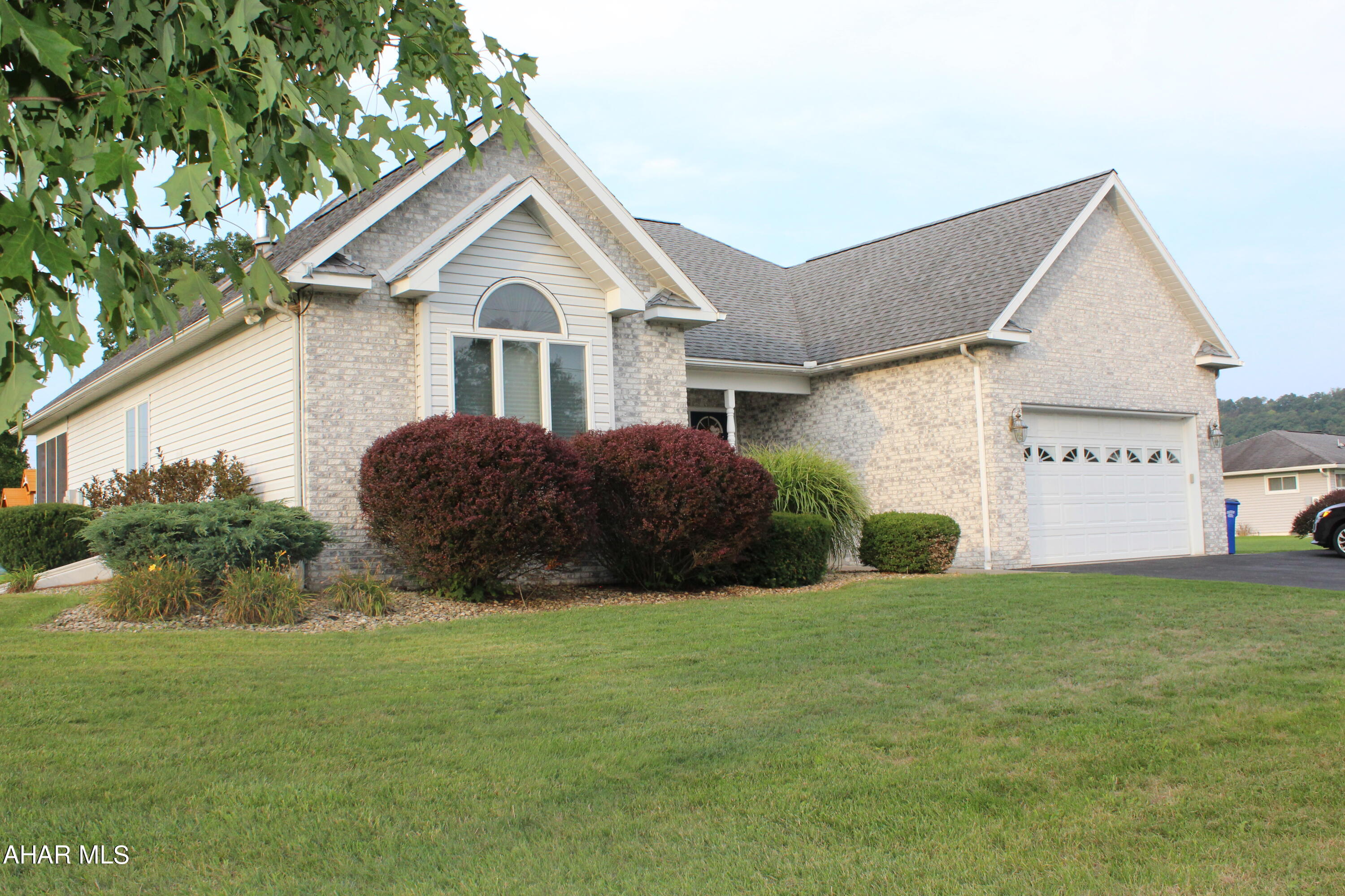 Drive up the newly sealed driveway to this beautiful home. With its easy maintenance landscaping and exterior you will be able to enjoy the quiet neighborhood!
Home is open concept with recessed lighting. Beautiful hardwood floors in most of the rooms. Living room with marble propane fireplace and vaulted ceilings. Kitchen has beautiful cabinetry, granite countertops and backsplash. Private main level primary bedroom with ensuite and two other bedrooms on the first floor. Convenient main level laundry. You could comfortably live on the main floor, but there is a spacious basement with two additional bedrooms, full bath, and is plumbed for a kitchen. There are ample storage areas, and it does walkout. Schedule a private tour!